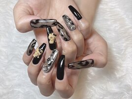 黒スカルプと愛らしいくま
