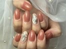 上品リボンアートで可愛い指先に