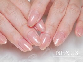 オレンジピンクの艶感ネイル