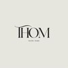 トム(Thom)のお店ロゴ
