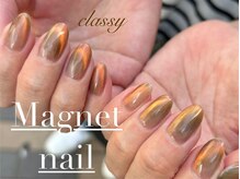 クラッシー(classy)/オレンジの粒子が輝くマグネット