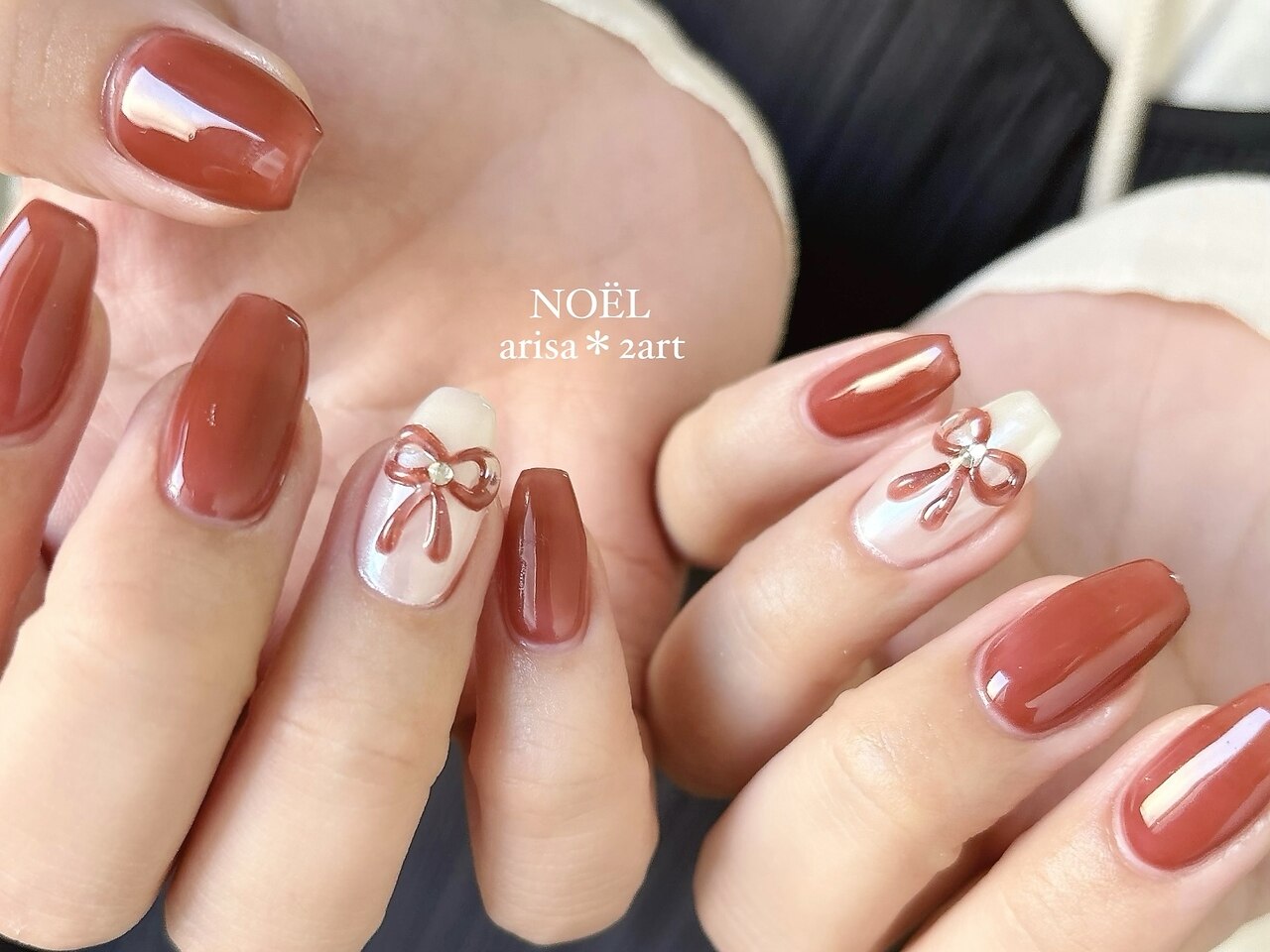 2025年-2026年冬トレンド】ボルドー リボン ハンドのネイルデザイン集