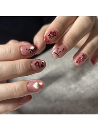 ハートとリボンのガーリーネイル