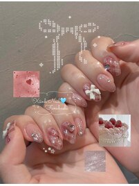かわいいチェックリボンネイル