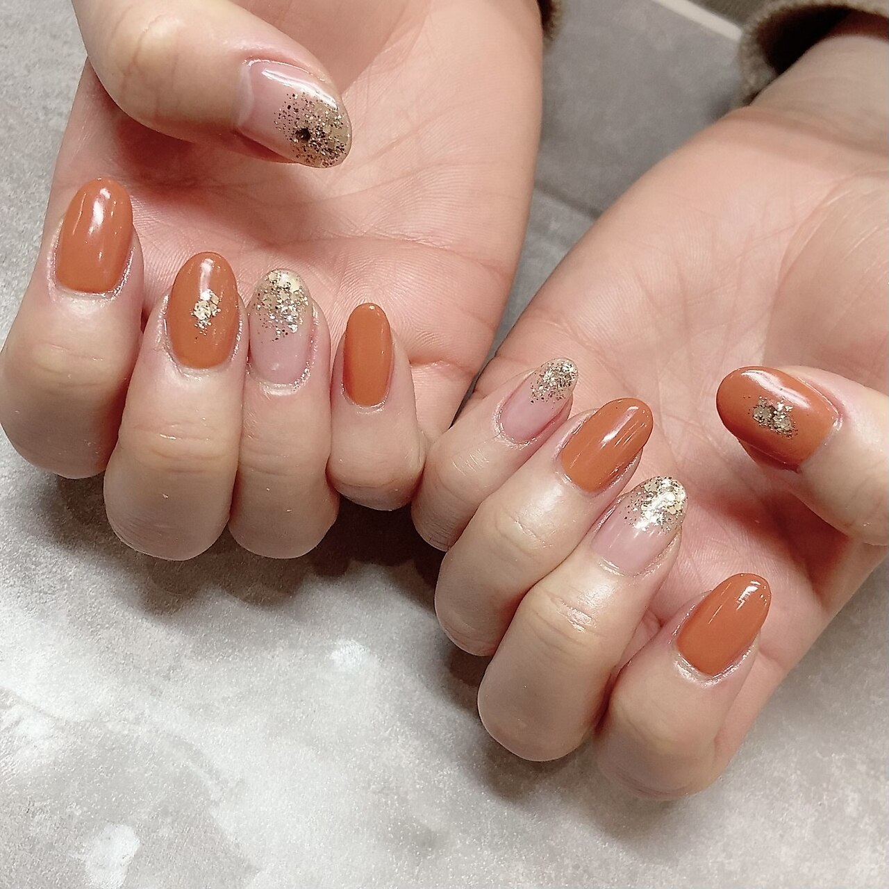 2025年-2026年冬トレンド】オレンジ ワンカラーのネイルデザイン集