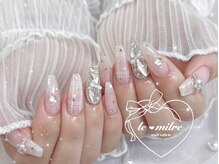 ル ミリィ(le milre)/チェックと星のネイル