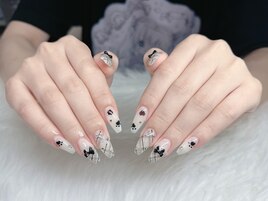 黒リボン×チェックネイル