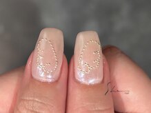 シー(SHE)/羽モチーフ