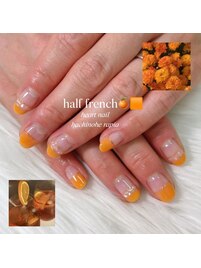 オレンジハーフフレンチネイル