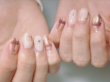 ネイル ファンシーファング(nail_fancy_fang)/チェック×ぷっくりリボンネイル