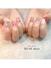 ふんわりレッドのチェックネイル