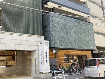 ニュアージュ 小伝馬町(Nuage)/カフェの裏側がマンション入口