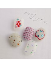 アトリエ プラス リム(atelier +LIM)/さりげない赤とチューリップ