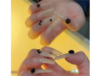 ネイルアンドアイラッシュスタジオ シュシュ(chouchou)/きらきらに黒リボン