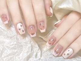 リボンモチーフが可愛いネイル
