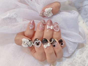 左右色違いリボンネイル