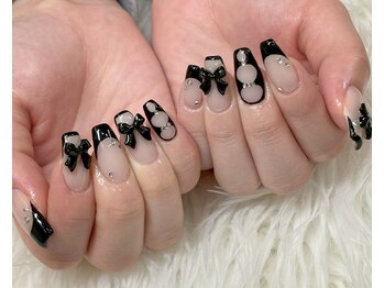 個性派ネイル・黒フレンチリボン
