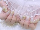 ホワイト ゴールド リボンネイル