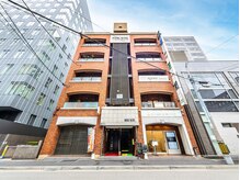 ミライズ整体院 三宮駅前院/外観【レンガ調おしゃれな建物】