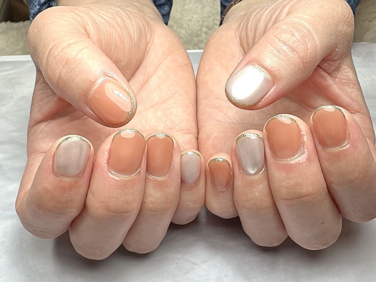 2025年-2026年冬トレンド】オレンジ ワンカラーのネイルデザイン集