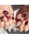 リボンにドットのガーリーネイル