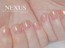 オレンジのヘルシーチークネイル
