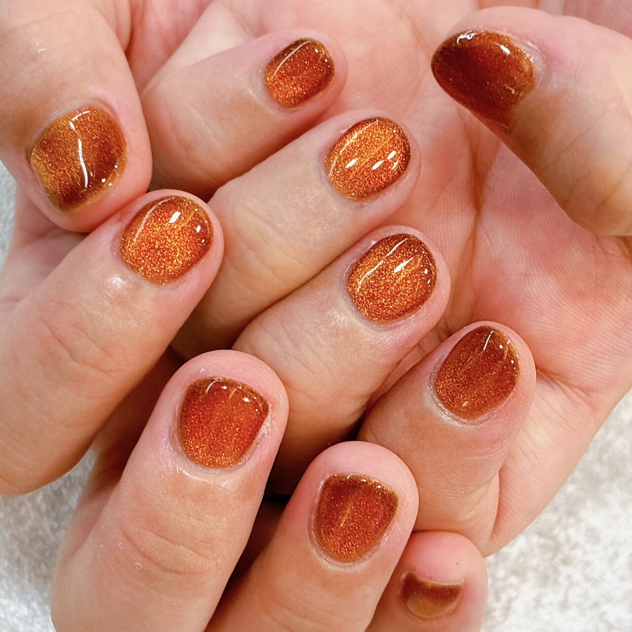 2025年-2026年冬トレンド】オレンジブラウンのネイルデザイン集｜人気