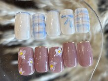 ニンニ(ninni)/チェック・お花ネイル