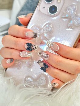 ナナズネイル 魚町店(NANA’sNail)/ブラック×リボン