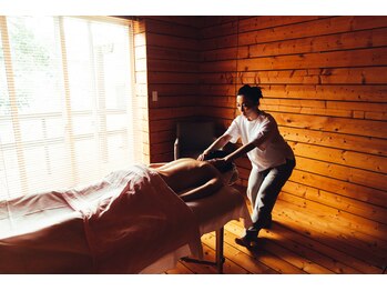 結/夕日の中のオイルマッサージ