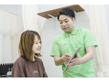 ぜんた整骨院/iPadを使って症状説明