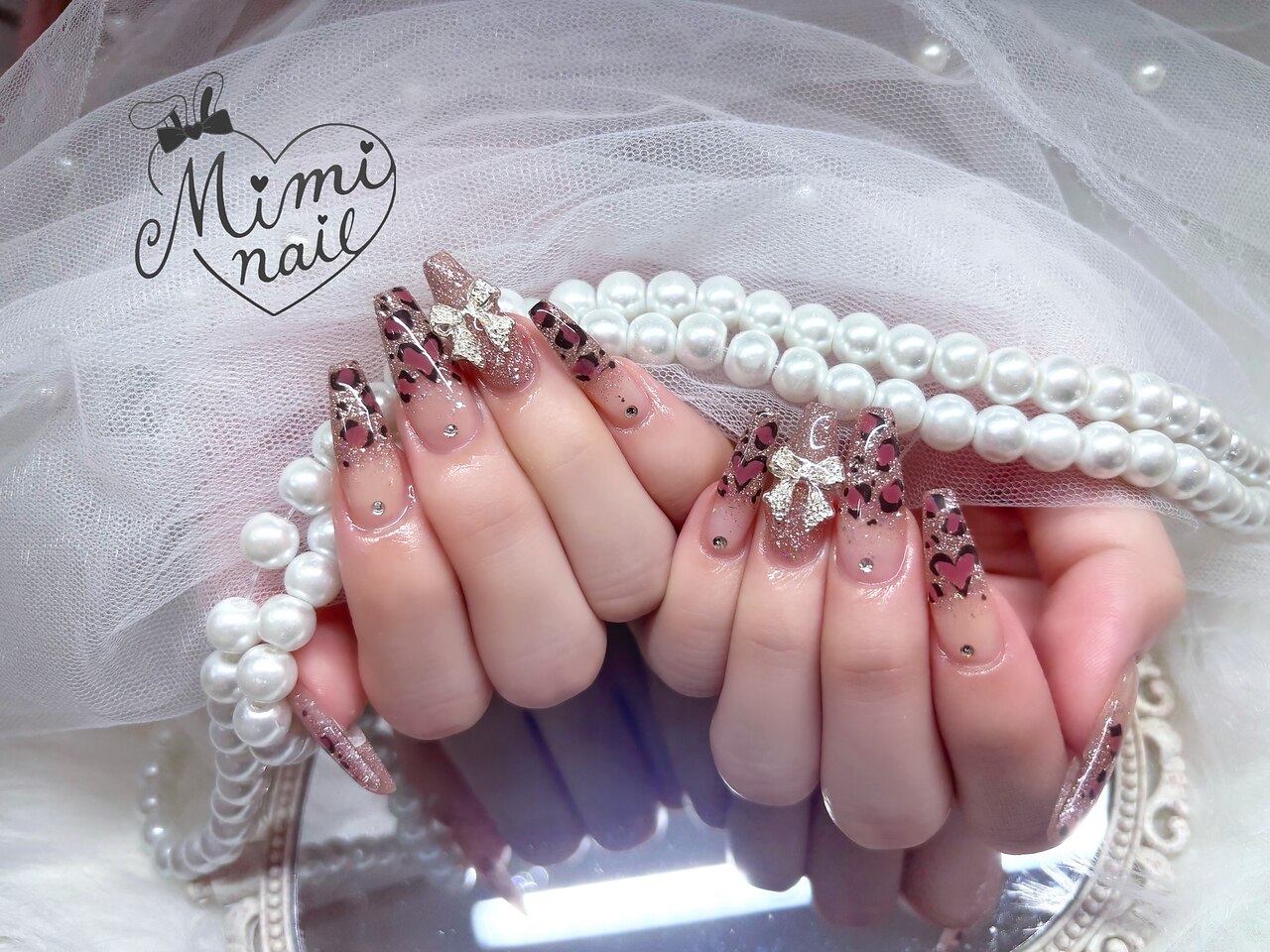 2025年-2026年冬トレンド】ピンクレオパードのネイルデザイン集｜人気