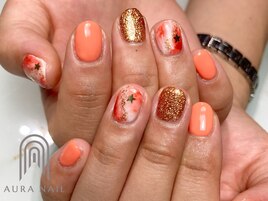 オレンジ×ラメの元気なネイル◎