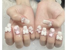 プトゥプトゥ(ptu ptu)/リボン×ハートホワイトネイル