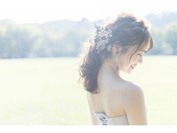 イシス ジェニー マルヤマクラス店(ISIS Genny)/大きく背中の開いたドレスに自信