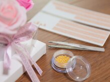 ピンクローズ(PInk Rose)の雰囲気（耳つぼを施術する粒です。1.5mmなので人からはほぼ見えません◎）