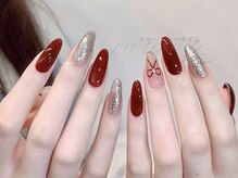 トゥートゥー(TOUTOU)/リボンxキラキラネイル