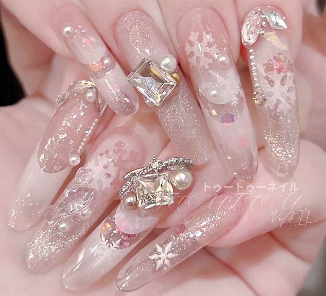 2025年-2026年冬トレンド】パール リボンのネイルデザイン集｜人気順
