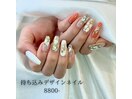 オレンジ×ホワイトネイル
