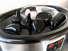 アフロディーテ ビューティーの雰囲気（たっぷり60個以上のホットストーン。部位ごとに形と温度を変えて）