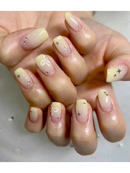 パステルイエローリボンネイル