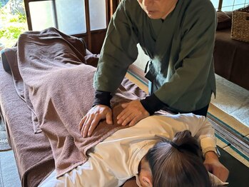 たにあん/背中が張っている