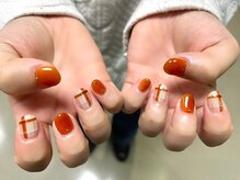 ネイルサロンアンドスクール ミュー(Nail Salon & school mieux)/オレンジチェックデザイン