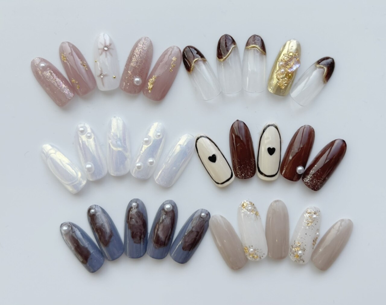 2026年冬トレンド】クリア ハートのネイルデザイン集｜人気順