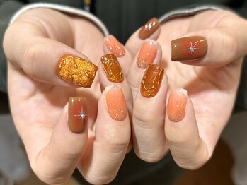 オレンジでホリデーネイル