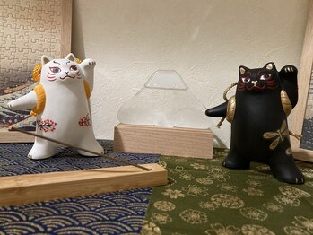 笑み屋/玄関を開けると…