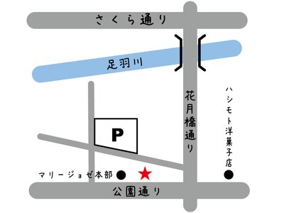 サロン建物の裏、マリージョゼ駐車場の一番看板寄りの端です