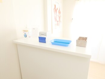 Kアプローチ三重桑名研究所 操整堂/受付カウンタ