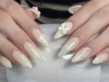 サリーネイルラボ(Sully Nail Lab)/薄め黄色ネイル、リボン付け