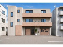 ニコリ 新富店(nicoRi)の雰囲気（駐車場は広々12台完備！(仲の橋通り)）